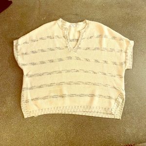 Vince cream poncho with black details